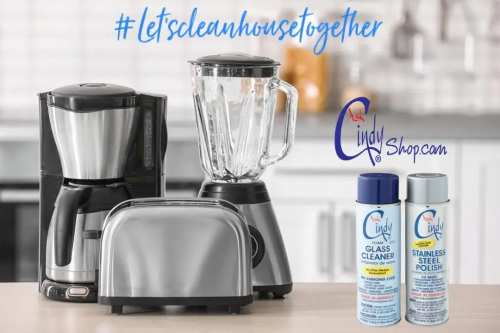 a stainless steel coffee maker, blender and toaster, a can of glass cleaner and a can of stainless steel polish, holiday season. holiday cleaning