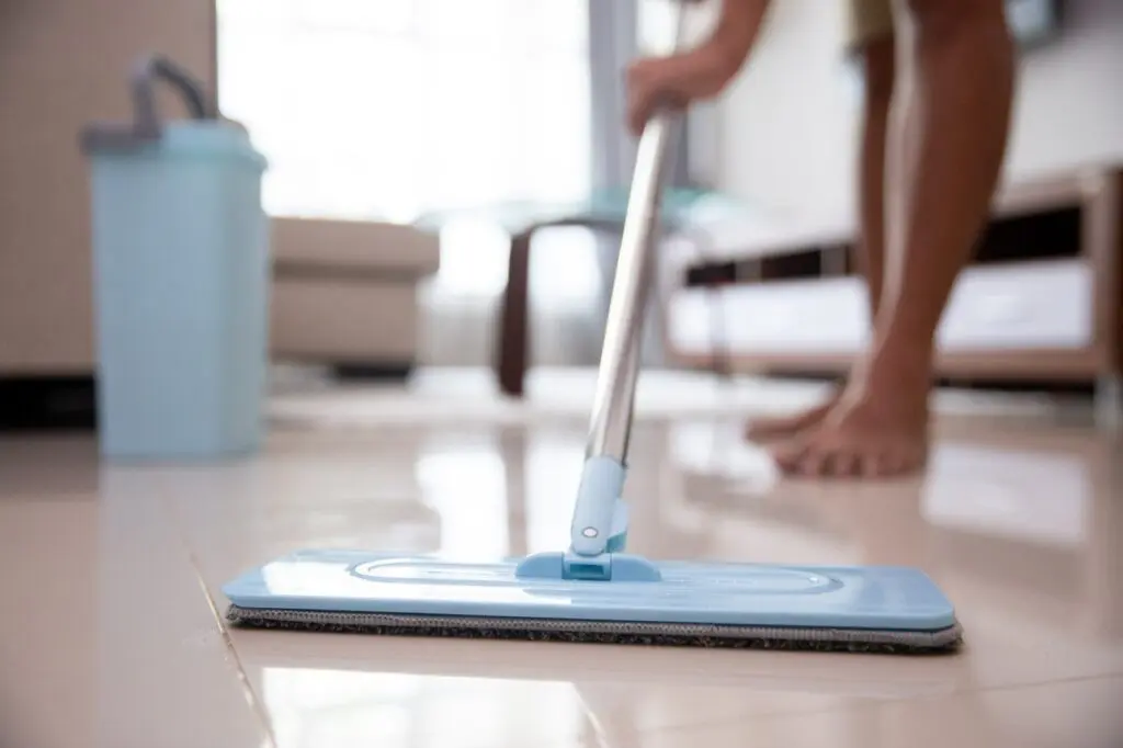 Mopping the kitchen floor, dirty floors