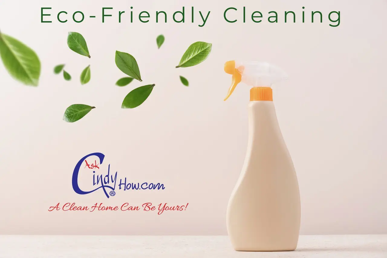 Eco-friendly cleaning spray with green leaves.