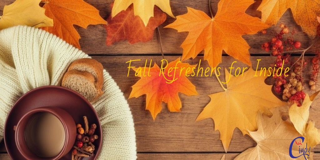 a mug of hot chocolate with herbs and toast on a background of autumn leaves, fall refreshers for the inside
