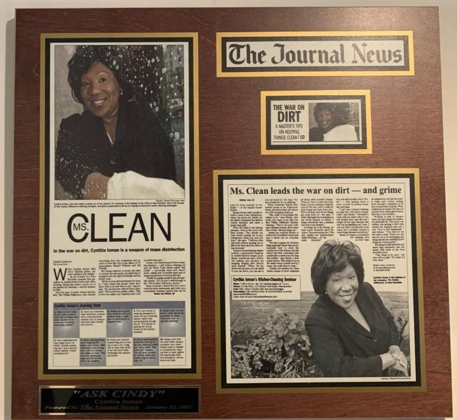 a framed article from The Journal News recognizing Cindy Inman and her war on dirt and grime