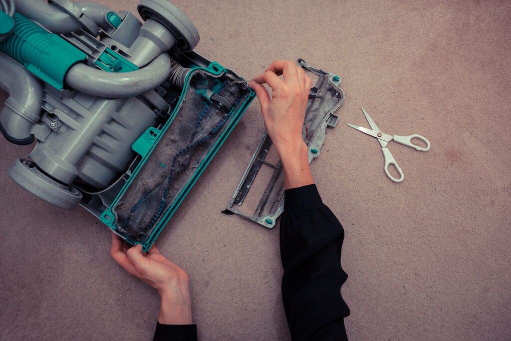 Cleaning out the inside of the vacuum