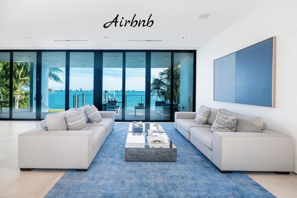 a clean living room overlooking the water